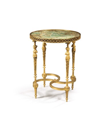 View full screen - View 1 of Lot 408. A Louis XVI style gilt-bronze, blue metal and fluorspar gueridon, after a model by Adam Weisweiler.