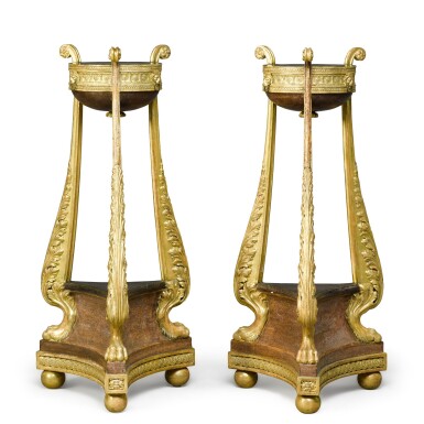 View full screen - View 1 of Lot 36. A pair of late George III giltwood and simulated porphyry torchères, circa 1800, in the manner of François Hervé.