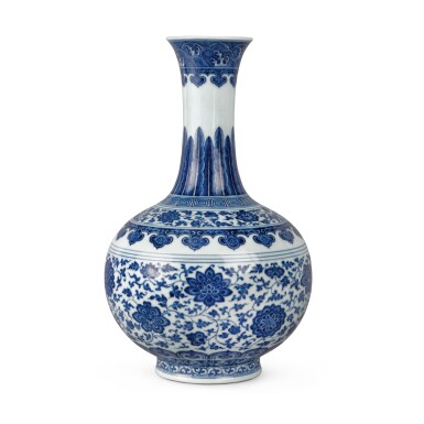 View full screen - View 1 of Lot 75. A blue and white Ming-style bottle vase, Seal mark and period of Qianlong | 清乾隆 青花纏枝花卉紋賞瓶 《大清乾隆年製》款.