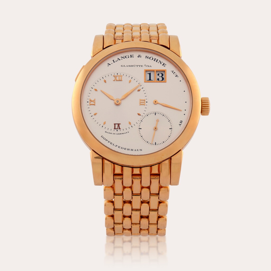 View full screen - View 1 of Lot 206. Lange 1, Reference 101.032 | A pink gold wristwatch with digital date display, power reserve indication and Wellendorff bracelet | Circa 2019.