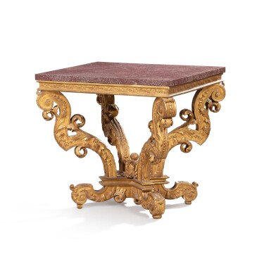 View full screen - View 1 of Lot 28. A giltwood center table, French Regence style, with a porphyry top | Table de milieu en bois doré de style Régence, avec un plateau en porphyre massif.