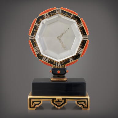 View full screen - View 1 of Lot 51. A yellow gold, enamel, rock crystal, onyx, coral, and diamond-set 'Mystery Clock', Circa 1925.