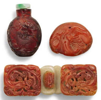 View full screen - View 1 of Lot 308. A RED JADEITE 'CHILONG' BELT BUCKLE QING DYNASTY, 19TH CENTURY | 清十九世紀 翠玉雕螭龍帶扣.