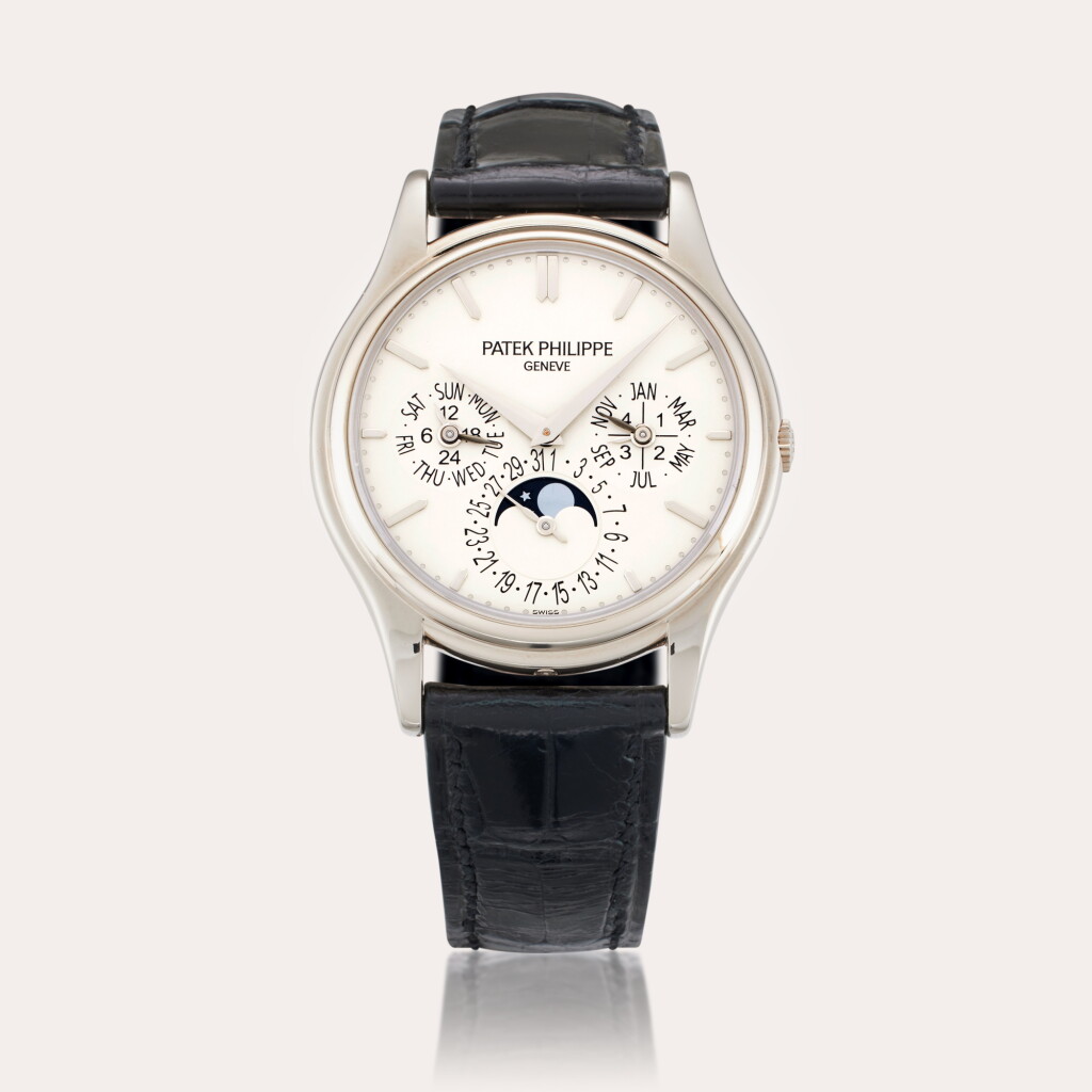 View full screen - View 1 of Lot 34. Reference 5140G-001 | A white gold automatic perpetual calendar wristwatch with moon phases, 24-hour indication, and leap year indication, Circa 2007.