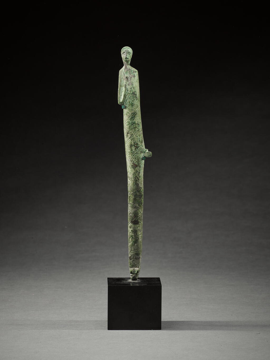 View full screen - View 1 of Lot 206. A Bronze Figure of a Priest, Umbro-Etruscan, circa 4th century B.C..