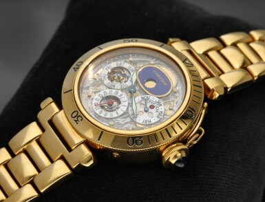 View full screen - View 1 of Lot 185. REFERENCE 2000 PASHA A YELLOW GOLD SEMI-SKELETONIZED TOURBILLON AUTOMATIC PERPETUAL CALENDAR WRISTWATCH WITH BRACELET, CIRCA 2000.