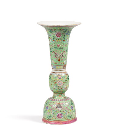 View full screen - View 1 of Lot 3327. A lime-green ground famille-rose 'Bajixiang' vase, Qing Dynasty, Daoguang period | 清道光 綠地粉彩八吉祥番蓮紋花觚.