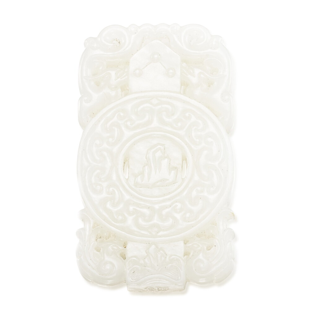 View full screen - View 1 of Lot 495. A white jade 'constellations tablet' plaque, Qing dynasty, 18th - 19th century 清十八至十九世紀 白玉雕圭璧牌.