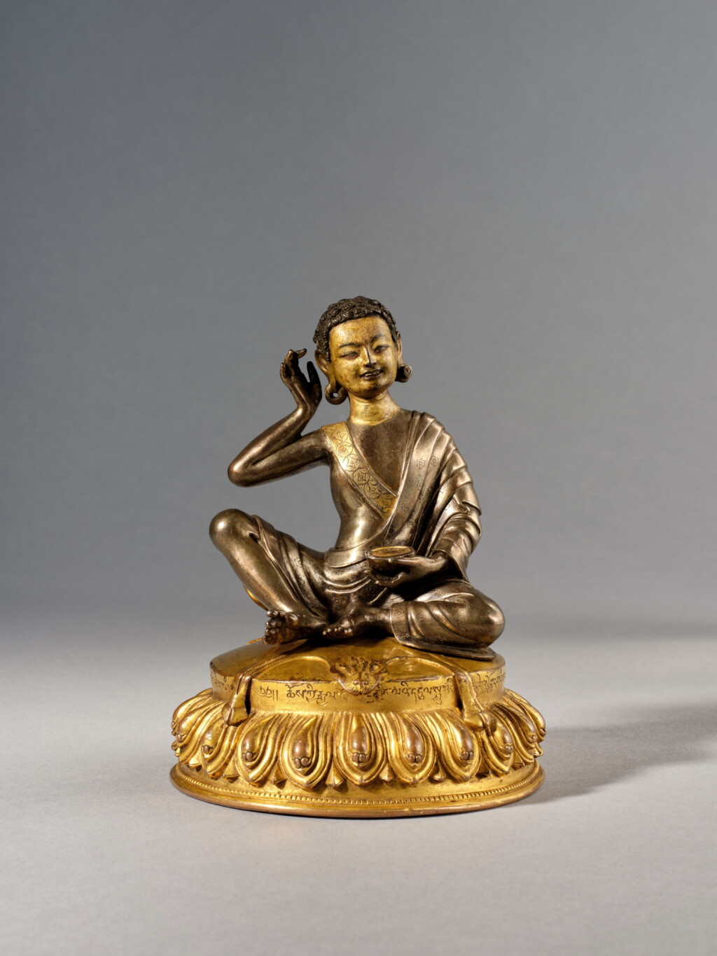 View full screen - View 1 of Lot 108. The Nyingjei Lam parcel-gilt silver and gilt-copper figure of Milarepa, Tibet, 15th century.