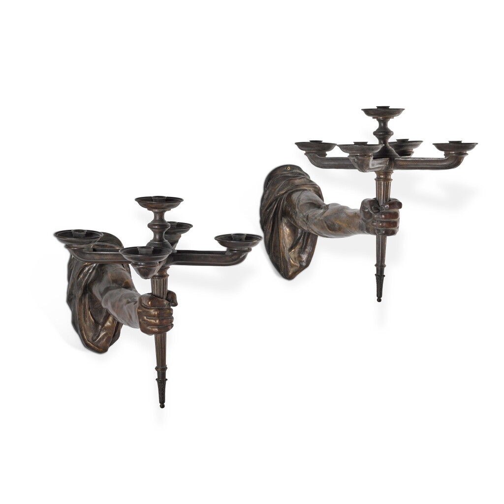 View full screen - View 1 of Lot 141. A pair of parcel-gilt bronze five-light anthropomorphic wall lights, late 19th/early 20th century.
