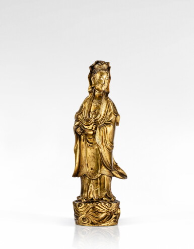 View full screen - View 1 of Lot 128. A gilt-bronze figure of Guanyin, China, Qing dynasty, 19th century.
