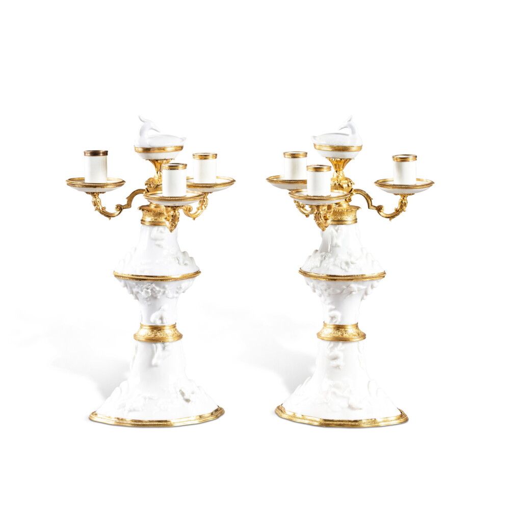 View full screen - View 1 of Lot 429. A pair of gilt-bronze mounted Chinese blanc de Chine candelabra, the porcelain Dehua, late 17th early/18th century, the mounts Régence, circa 1715-1725.