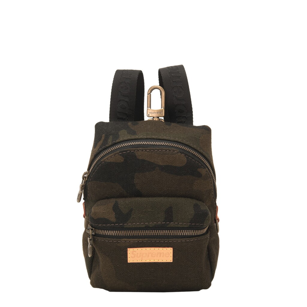 View full screen - View 1 of Lot 56. Louis Vuitton x Supreme Camouflage "Apollo" Nano Backpack of Canvas, Leather and Gold Tone Hardware.