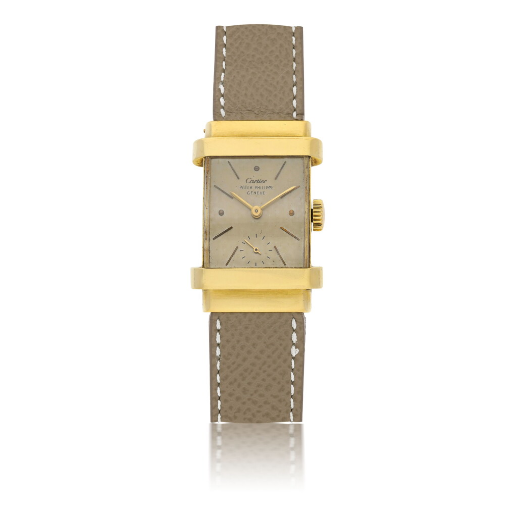 View full screen - View 1 of Lot 112. PATEK PHILIPPE | REF 1450 'TOP HAT', RETAILED BY CARTIER: A YELLOW GOLD RECTANGULAR WRISTWATCH CIRCA 1950.