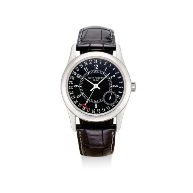 View full screen - View 1 of Lot 510. PATEK PHILIPPE | A WHITE GOLD WRISTWATCH WITH DATE, CIRCA 2005.