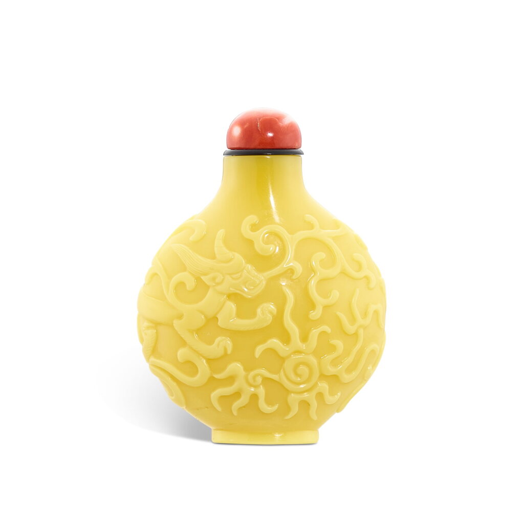 View full screen - View 1 of Lot 575. An imperial yellow glass 'chilong' snuff bottle, Seal mark and period of Qianlong 清乾隆 御製黃料螭龍紋鼻煙壺 《乾隆年製》款.
