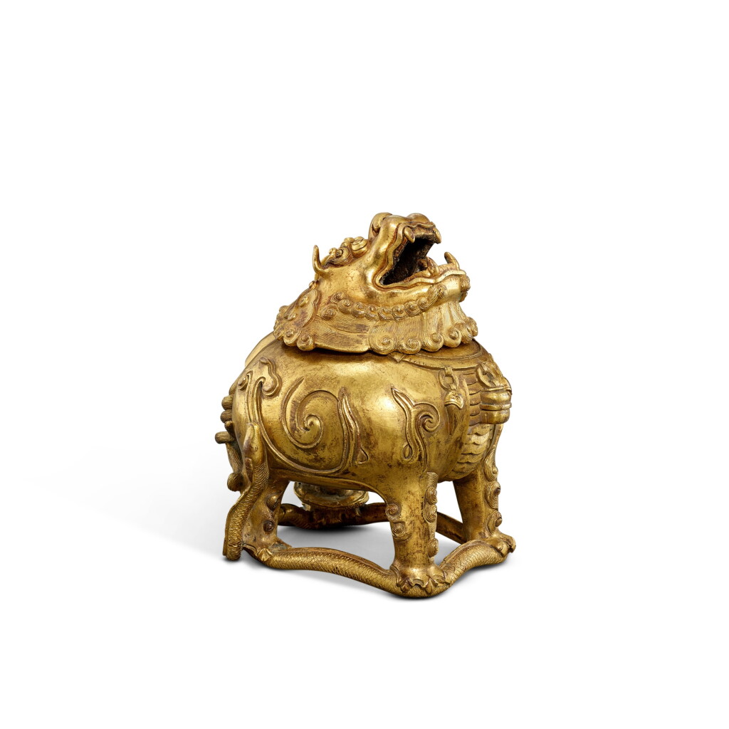 View full screen - View 1 of Lot 5640. A gilt-bronze 'mythical beast' incense burner, Ming dynasty | 明 銅鎏金甪端香爐.