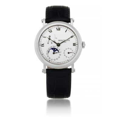 View full screen - View 1 of Lot 558. PATEK PHILIPPE | REF 5054 WHITE GOLD WRISTWATCH WITH DATE, POWER RESERVE AND MOON PHASE INDICATION CIRCA 2000.