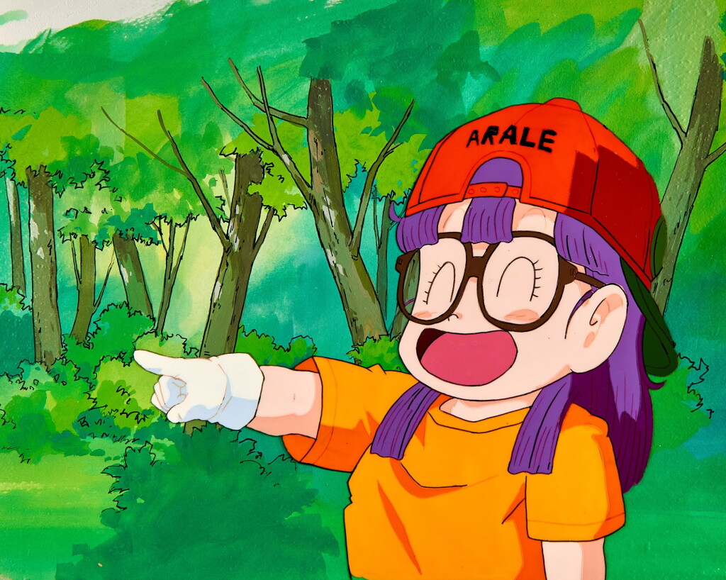 View full screen - View 1 of Lot 87. Arale Laughing and Pointing Forward Animation Cel with Douga and Hand-painted Original Background | 笑指前方的阿拉蕾賽璐璐,附線稿和手繪原裝背景.