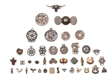 View full screen - View 1 of Lot 46. A study collection of forty ornaments, Thokcha, Himalayan regions, Central Asia and China, 11th/17th century | 喜馬拉雅地區,中亞,中國 十一至十七世紀 托查一組四十件.