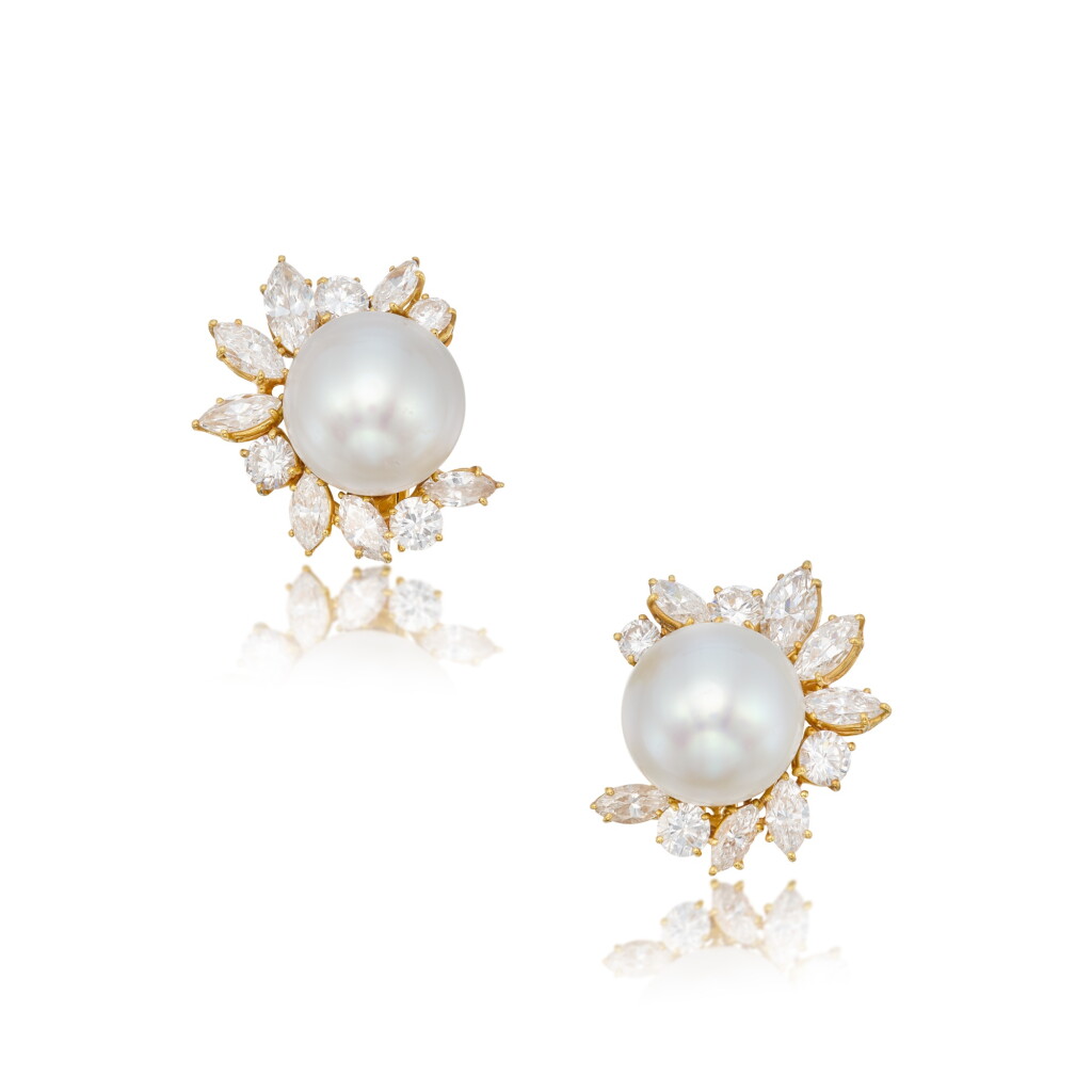 View full screen - View 1 of Lot 132. A Pair of Cultured Pearl and Diamond Earclips.