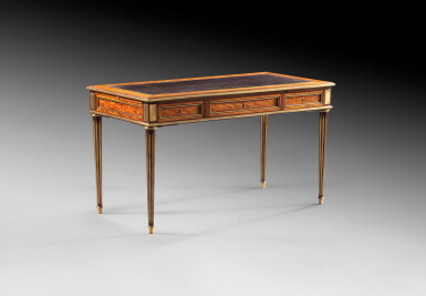View full screen - View 1 of Lot 45. A gilt-bronze and brass-mounted satinwood and amaranth desk stamped by Saunier, Louis XVI, circa 1780 | Bureau plat en placage d'amarante et de citronnier et monture de bronze et de laiton doré, d'époque Louis XVI, estampillé Saunier, vers 1780.