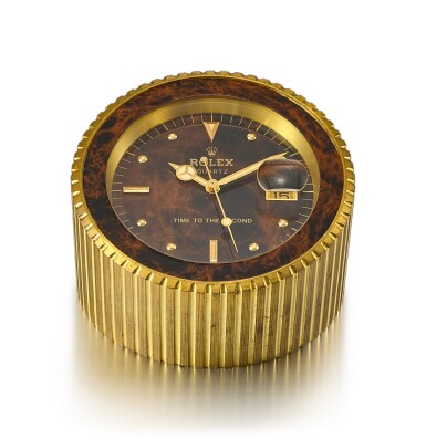 View full screen - View 1 of Lot 8115. ROLEX | REFERENCE 455, A HEAVY GILT BRASS DISPLAY DESK CLOCK WITH STOP FEATURE AND DATE, CIRCA 1985.