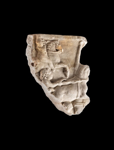 View full screen - View 1 of Lot 189. A Roman Marble Erotes Sarcophagus Fragment with Chariot Race, 3rd Century A.D..