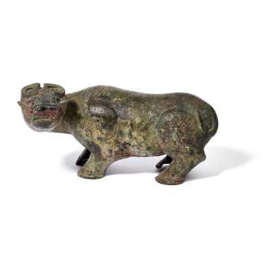 View full screen - View 1 of Lot 577. A BRONZE FIGURE OF A BUFFALO, WESTERN ZHOU PERIOD .