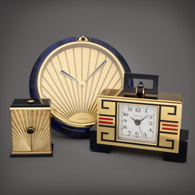 View full screen - View 1 of Lot 414. Three desk timepieces, 1980s - 1990s.