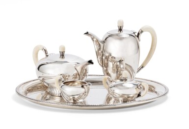 View full screen - View 1 of Lot 32. A German silver tea and coffee set, ivory handles, Wilhelm Binder, Schwäbisch Gmünd, circa 1920 | Service à thé et café en argent, les manches en ivoire, par Wilhelm Binder, Schwäbisch Gmünd, vers 1920.