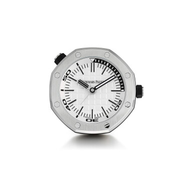 View full screen - View 1 of Lot 204. AUDEMARS PIGUET | ROYAL OAK, A BRAND NEW STAINLESS STEEL ALARM DESK CLOCK WITH WOODEN STAND, CIRCA 2016.