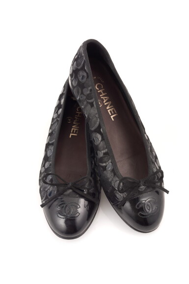 View full screen - View 1 of Lot 19. PAIR OF BLACK PATENT LEATHER FLATS, CHANEL.