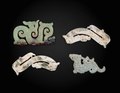 View full screen - View 1 of Lot 35. A group of four archaistic jade ornaments In the Warring States style | 戰國時期風格玉飾一組四件.