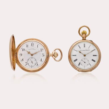 View full screen - View 1 of Lot 616. A group of two watches including a pink gold hunting cased watch by J. Assmann, Glashütte, and a pink gold plated open-faced watch by IWC, Circa 1895-1910.