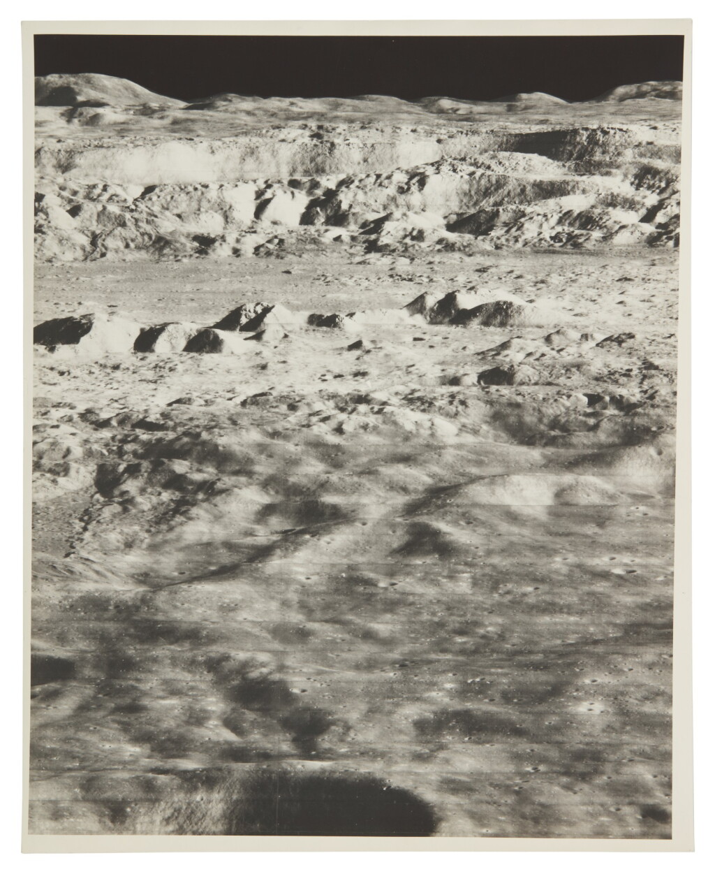View full screen - View 1 of Lot 4. LUNAR ORBITER II. "THE PICTURE OF THE CENTURY" — OBLIQUE VIEW INTO CRATER COPERNICUS, 24 NOVEMBER, 1966..