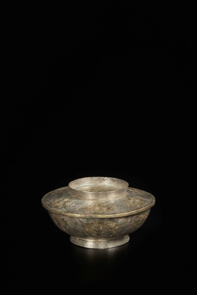 View full screen - View 1 of Lot 265. A rare inscribed parcel-gilt silver 'floral' bowl and cover, Liao dynasty, dated to the 5th year of Taiping, corresponding to 1025 | 遼太平五年 (1025年) 銀局部鎏金鏨折枝花卉雙鳳紋蓋盌.