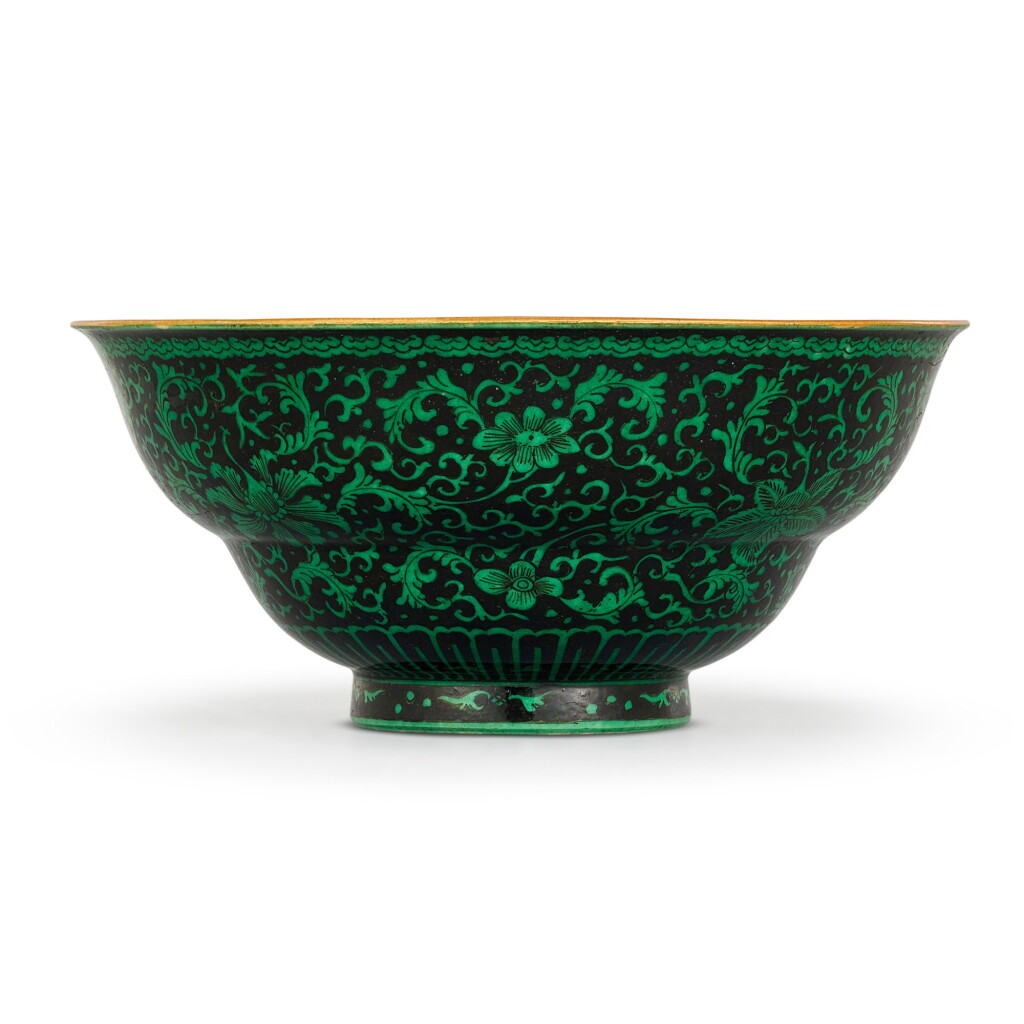 View full screen - View 1 of Lot 468. A RARE BLACK-GROUND GREEN-ENAMELLED 'FLORAL' OGEE BOWL SEAL MARK AND PERIOD OF QIANLONG | 清乾隆 墨地綠彩花卉紋折腰盌 《大清乾隆年製》款.