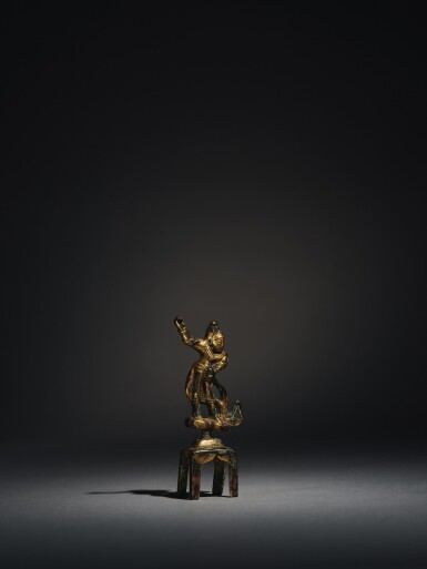 View full screen - View 1 of Lot 3520. A gilt-bronze figure of Dvarapala Tang dynasty | 唐 鎏金銅力士立像.