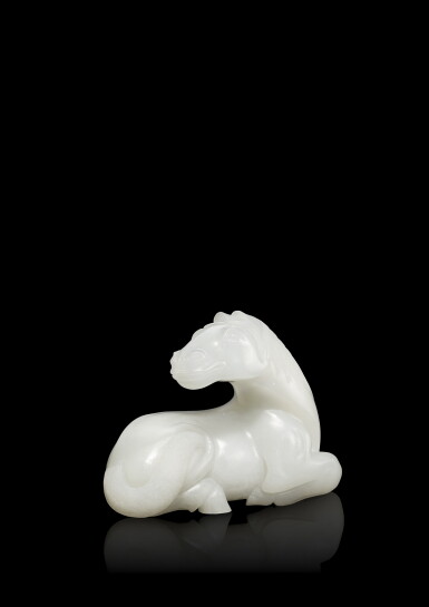 View full screen - View 1 of Lot 3620. A white jade figure of a recumbent horse, Qing dynasty, 18th century | 清十八世紀 白玉臥馬.