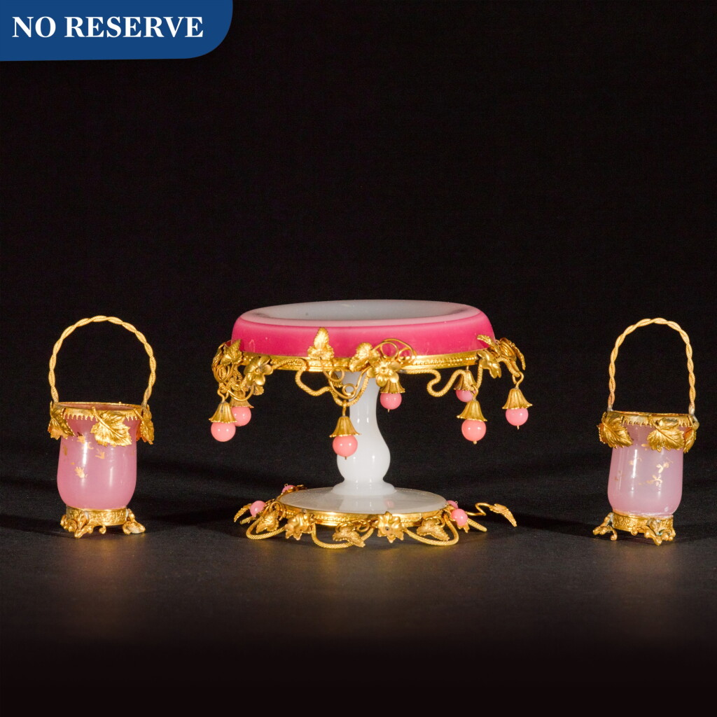 View full screen - View 1 of Lot 125. A semi-opaque glass gilt-metal-mounted sweetmeat stand and two small baskets, late 19th century, probably French.