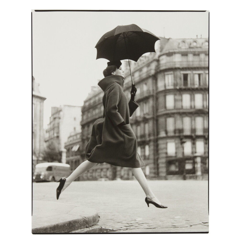 View full screen - View 1 of Lot 204. RICHARD AVEDON | CARMEN, HOMAGE TO MUNKACSI, COAT BY CARDIN, PLACE FRANÇOIS-PREMIER, PARIS.