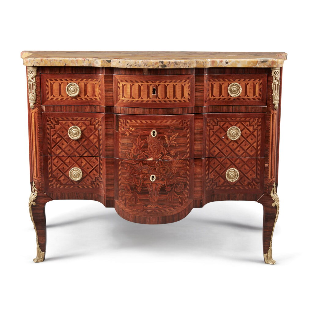 View full screen - View 1 of Lot 70. Louis XV/XVI Transitional Gilt-Bronze-Mounted Kingwood, Tulipwood and Marquetry Commode, Probably Eastern France, Circa 1770.