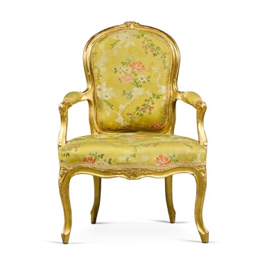 View full screen - View 1 of Lot 705. A Louis XV style carved giltwood fauteuil, late 19th century.