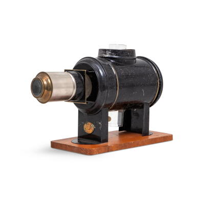 View full screen - View 1 of Lot 474. (Optical Apparatus) | A charming toy magic lantern.