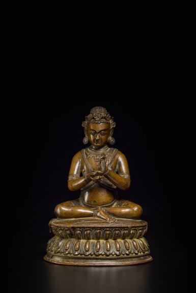 View full screen - View 1 of Lot 805. An inscribed copper alloy figure of Mahasiddha Krishnacharya, Tibet, 15th / 16th century.