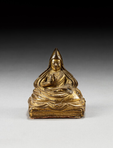 View full screen - View 1 of Lot 139. A gilt-bronze figure of the fifth Dalai Lama, Ngawang Lopsang Gyatso (1617-1682) Tibet, 17th-18th century | 西藏 十七至十八世紀 鎏金銅五世達賴喇嘛坐像.