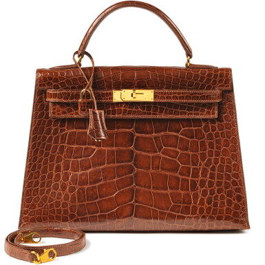 View full screen - View 1 of Lot 720. Vintage Cognac Shiny Mississippiensis Alligator Kelly 32 Sellier Gold Hardware, 1998.