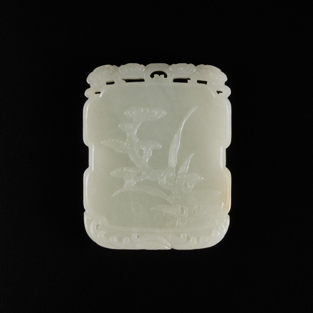View full screen - View 1 of Lot 213. A white jade 'Magu' plaque, Qing dynasty, 18th / 19th century | 清十八 / 十九世紀 白玉雕麻姑獻壽圖牌.