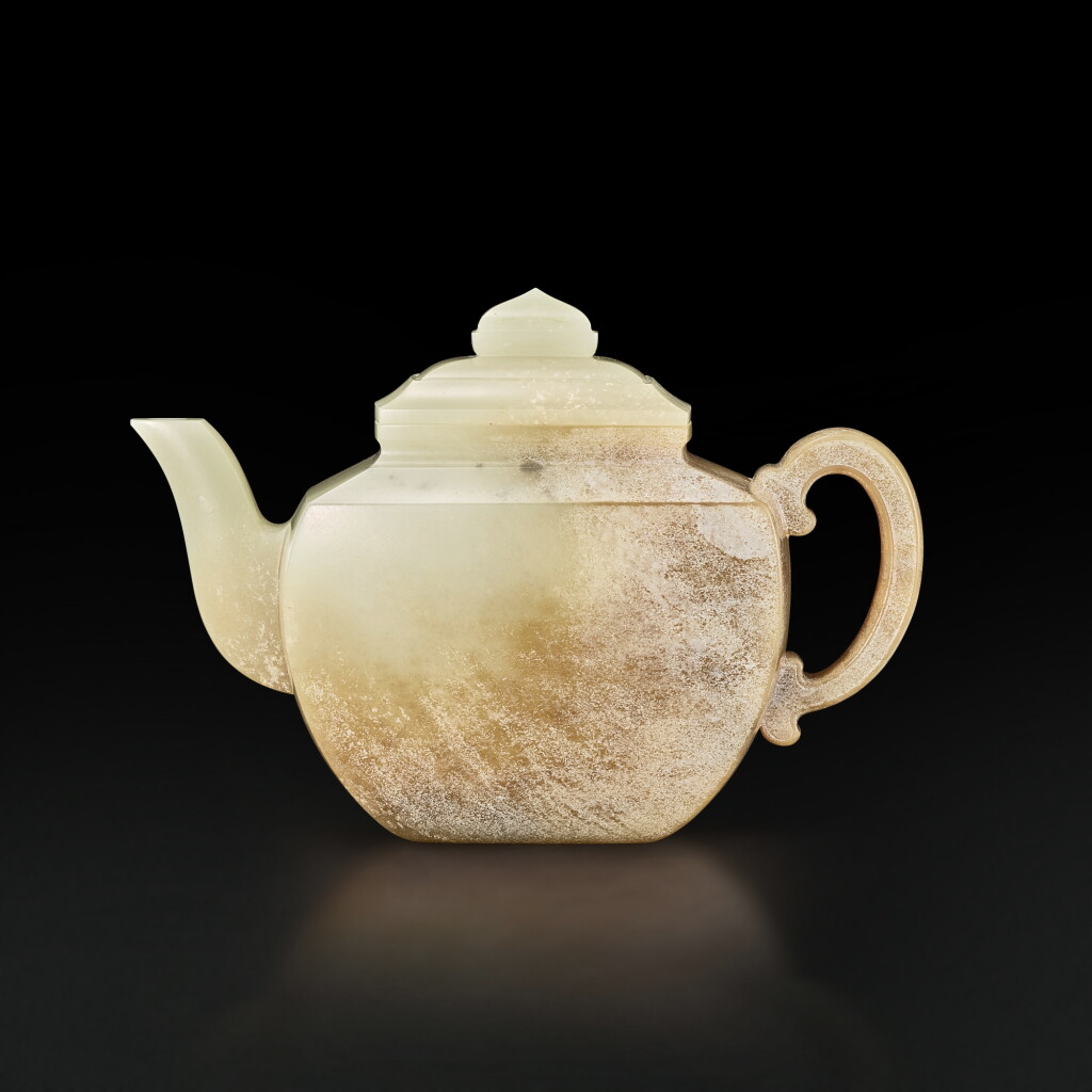 View full screen - View 1 of Lot 3692. A white and russet jade square teapot, Qing dynasty, 18th century | 清十八世紀 白玉帶皮方蓋壺.